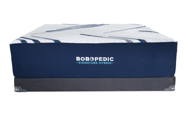 Bob-O-Pedic Signature Hybrid 13.5'' Queen Plush Low Profile Mattress Set with navy quilted sides, white top with blue stripes, and included gray foundation.