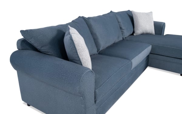 David Teal 114'' 2 Piece Right Arm Facing Chaise Sectional in teal polyester fabric with transitional track arms, removable seat back cushions, and included accent pillows.