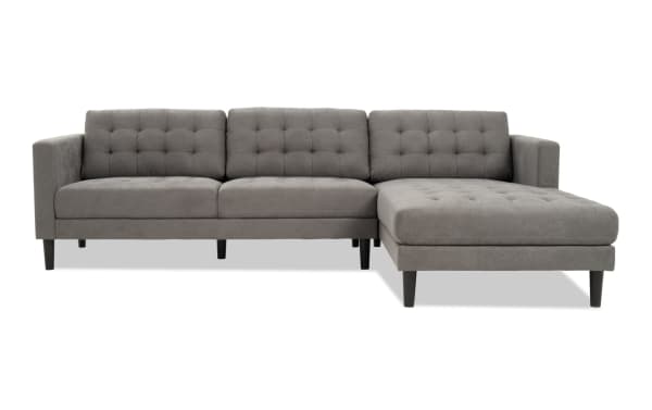 Metro Charcoal 112'' 2 Piece Right Arm Facing Chaise Sectional with tufted charcoal polyester fabric, track arms, and transitional style upholstery.