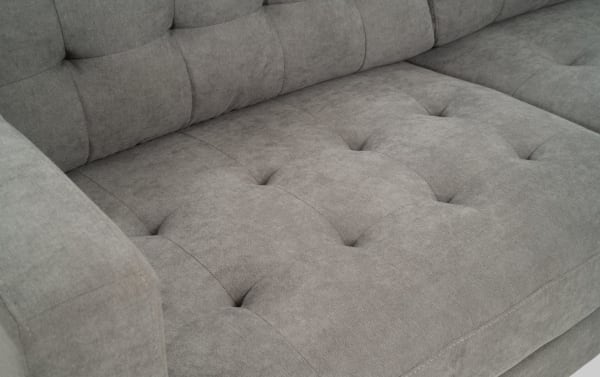 Charcoal gray Metro 112" 2-piece right arm facing chaise sectional with tufted polyester fabric upholstery, track arms, and transitional style.