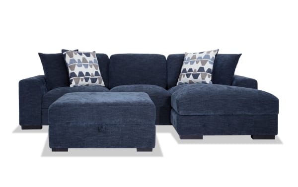 Contemporary Playground Navy 116" 2-piece right arm facing sectional with plush polyester fabric, pop-up sleeper loveseat, storage chaise, and matching storage ottoman.