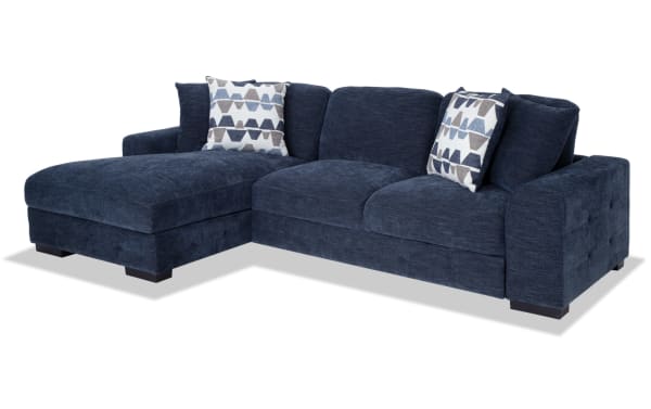 Playground Navy 116'' 2 Piece Left Arm Facing Pop-Up Sleeper Chaise Sectional in blue polyester fabric with memory foam cushions, tufted detailing, and storage chaise.