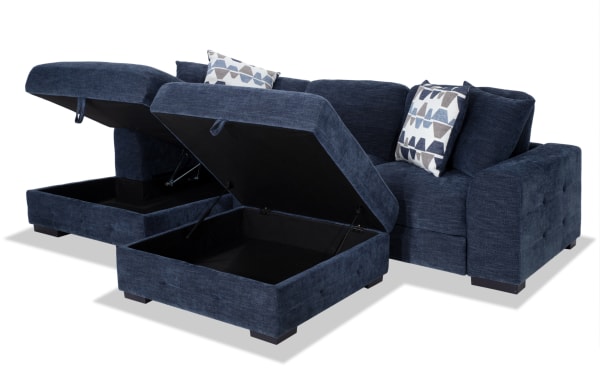 Playground Navy 116'' 2 Piece Left Arm Facing Pop-Up Sleeper Chaise Sectional with Storage Ottoman in navy polyester fabric, featuring memory foam cushions, hand-tufted detailing, oversized accent pillows, and hidden chaise storage for versatile contemporary living.