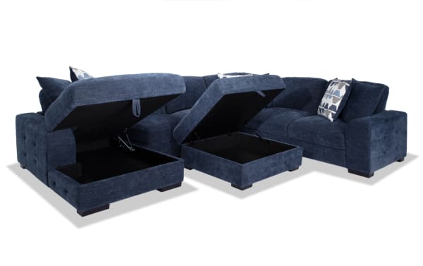 Contemporary Playground Navy 145" 4-piece left arm facing sectional with polyester fabric, pop-up sleeper loveseat, storage chaise, and ottoman.