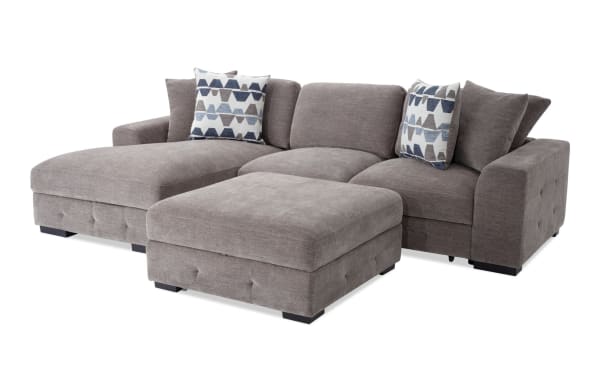 Playground Gray 116'' 2 Piece Left Arm Facing Pop-Up Sleeper Chaise Sectional with Storage Ottoman, contemporary gray polyester fabric with memory foam cushions, tufted detailing, oversized accent pillows, and hidden chaise storage.