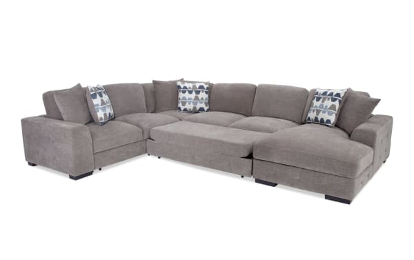 Playground Gray 145'' 4-piece right arm chaise sectional with armless pop-up sleeper, gray polyester fabric, contemporary style, memory foam cushions, tufted detailing, and storage chaise.