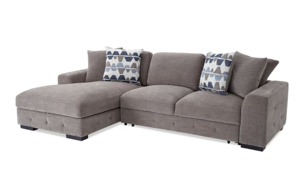 Contemporary Playground Gray 116'' 2-piece left arm chaise sectional in gray polyester fabric with tufted detailing, deep memory foam cushions, and four patterned accent pillows.
