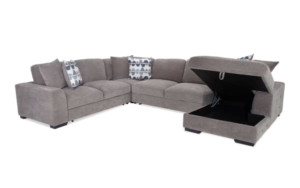 Contemporary Playground Gray 145'' 4-piece right arm facing chaise sectional with plush polyester fabric, deep memory foam cushions, hand-tufted details, and hidden storage in chaise.