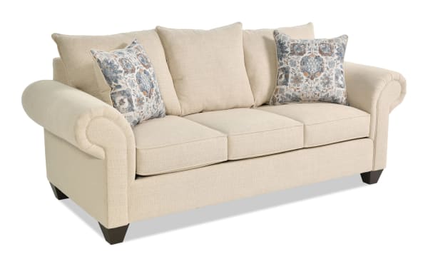 Chloe Beige 88'' Sofa from Chloe Living collection, transitional style beige polyester fabric with rolled arms, three seat cushions, coil springs, and two patterned accent pillows.
