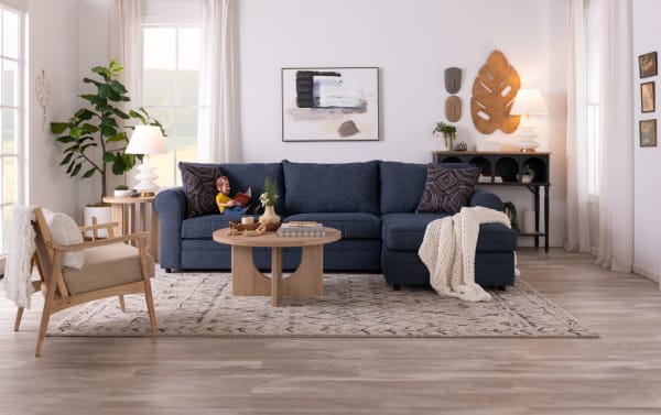 Juno Denim 114'' 3 Piece Left Arm Facing Sleeper Sectional in blue polyester fabric with transitional style, featuring Bob-O-Pedic cooling gel memory foam mattress.