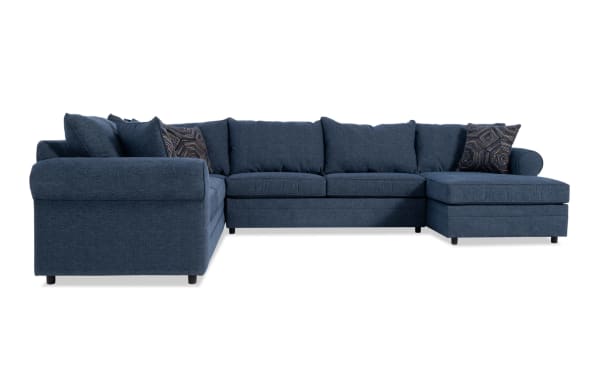 Juno Denim 142'' 4 Piece Right Arm Facing Chaise Sectional in blue polyester fabric with transitional style, memory foam cushions, and patterned accent pillows.