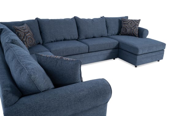 Juno Denim 142'' 4 Piece Right Arm Facing Chaise Sectional in blue polyester fabric with transitional style, memory foam cushions, and patterned accent pillows.