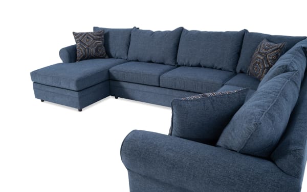 Juno Denim 142'' 4-piece left arm facing chaise sectional in blue polyester fabric with Bob-O-Pedic memory foam and patterned accent pillows, transitional style.