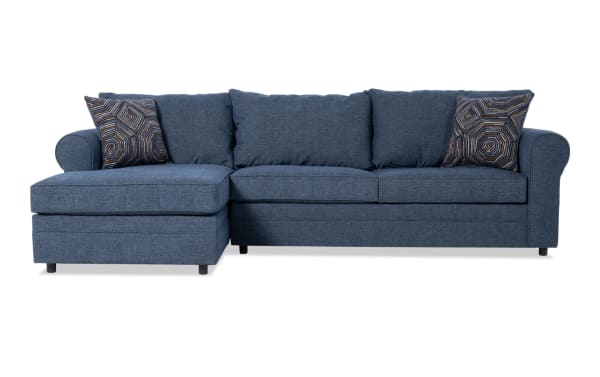Juno Denim 114" left arm facing sleeper chaise sectional in blue polyester fabric with transitional style, gel memory foam mattress, and patterned accent pillows.