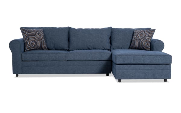 Juno Denim 114" 2-piece right arm facing sleeper chaise sectional in blue polyester fabric with transitional style, gel memory foam mattress, and patterned accent pillows.