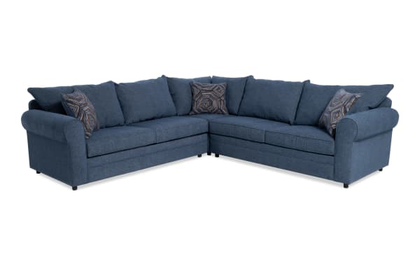Juno Denim 114" 3 Piece Sectional in blue polyester fabric with transitional style, featuring plush cushions and patterned accent pillows.