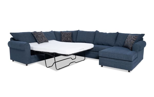 Juno Denim 142'' 4-piece right arm facing sleeper chaise sectional in blue polyester fabric with transitional style and gel memory foam mattress.