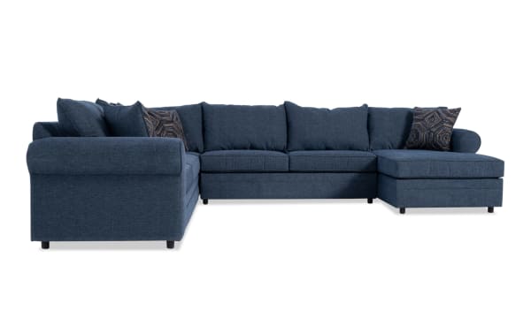 Juno Denim 142" 4-piece right arm facing sleeper chaise sectional in blue polyester fabric with transitional style, memory foam gel mattress, and accent pillows.