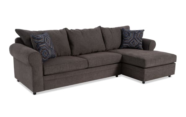 Juno Chocolate 114'' 2 Piece Right Arm Facing Chaise Sectional in brown polyester fabric with transitional style, memory foam cushions, and patterned accent pillows.