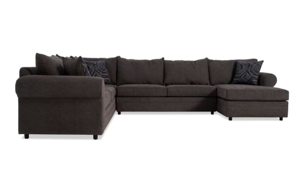 Juno Chocolate 142" 4-piece right arm facing sleeper chaise sectional in brown polyester fabric, transitional style with plush cushions and patterned accent pillows.