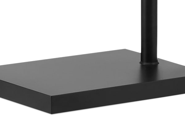 Matte black metal base of Luxe 89'' Black Arc Floor Lamp in rustic style, supporting the lamp’s curved arm with integrated rotary switch and charging ports.