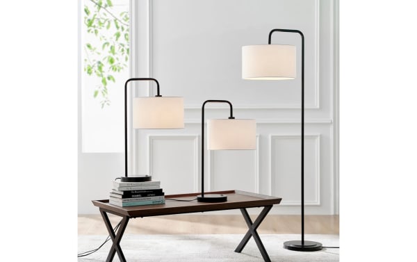 Pasadena 62.5'' black floor lamp with minimalist transitional design, metal frame, and white polyester fabric shade, ideal for office or living room.