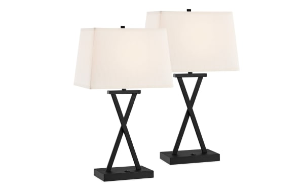 Set of 2 Calvin Black Table Lamps with cream polyester fabric shades, black metal X-shaped bases, transitional style for modern nightstands or end tables.