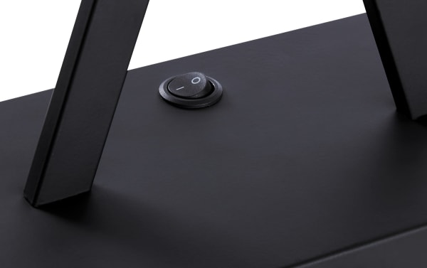 Close-up of the black metal base and on/off rocker switch of the Calvin Black Table Lamp, part of a transitional cream fabric set.