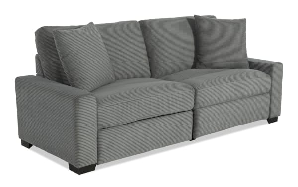 Aspen Charcoal 88" power reclining loveseat in soft gray polyester fabric with plush cushions, accent pillows, and USB/USB-C ports, transitional style.