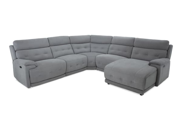 Contemporary Rumor Gray 119'' power reclining 5-piece sectional with right arm chaise, polyester fabric upholstery, power headrests, and memory foam cushions.
