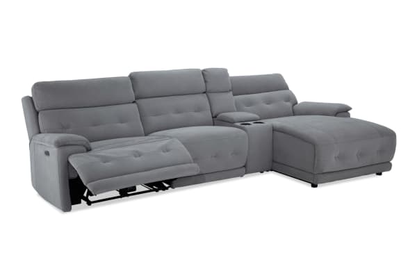 Rumor Gray 127'' power reclining 4-piece sectional with right arm chaise, armless chair, and power headrest in gray polyester fabric.