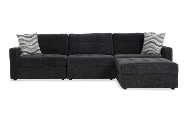 Contemporary Modular Bob® 4-piece charcoal gray fabric sofa with memory foam cushions, armless and arm-facing storage chairs, and storage ottoman.