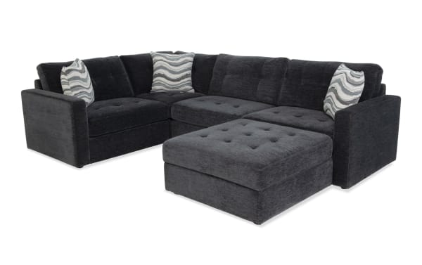 Contemporary Modular Bob® 5-piece charcoal gray fabric sectional with memory foam cushions, storage seats, corner unit, and storage ottoman.
