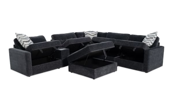 Charcoal gray Modular Bob® 7-piece contemporary sectional with polyester fabric upholstery, memory foam cushions, storage seats, console with USB ports, and storage ottoman.