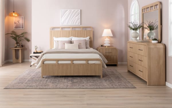 Cascade Full Brown Panel Bed in transitional style with engineered wood grain MDF, featuring intricate reeding, smooth corners, and four symmetrical openings.
