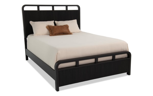 Cascade Twin Black Panel Bed from the Cascade Bedroom collection, featuring transitional style, black engineered wood grain MDF with intricate reeding on headboard and footboard, smooth rounded corners, and four symmetrical openings for visual interest.