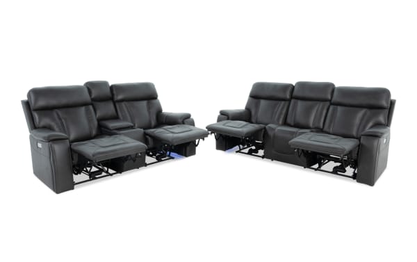 Showcase Black Leather 89" power reclining sofa and 77" console loveseat set in transitional style, featuring leather upholstery, USB ports, cup holders, and immersive audio.