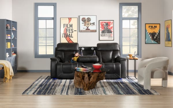 Showcase Black Leather 89'' Immersive Audio Power Reclining Sofa & Recliner in transitional style with leather upholstery, cup holders, and USB ports.
