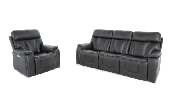 Showcase Black Leather 89'' Immersive Audio Power Reclining Sofa and Recliner in transitional style with leather and vinyl upholstery, built-in cup holders, and power recline features.