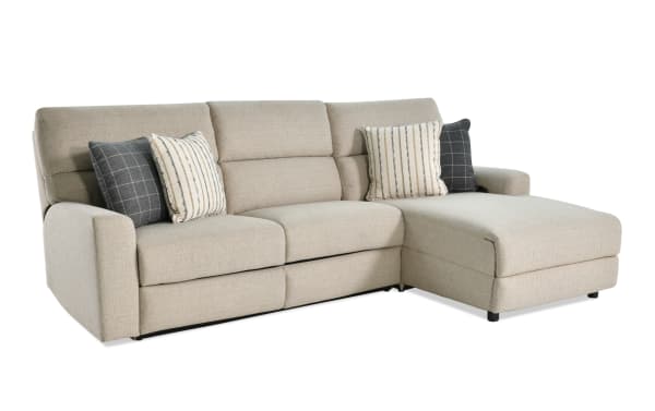 Modern Farmhouse beige 132'' 2-piece right arm facing power reclining sleeper chaise sectional in polyester fabric with power headrest and accent pillows.