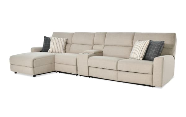 Modern Farmhouse beige 4-piece left arm facing fabric polyester sectional with power reclining seats, sleeper chaise, USB ports, cupholders, and accent pillows.