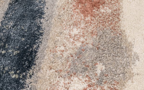 Cozy Pastels 5' x 8' multi abstract rug in heat-set polypropylene fabric with multicolored pastel strokes and contemporary design.