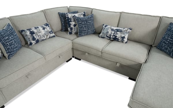 Playmax Gray 124'' 4-piece right arm facing storage chaise sectional with gray polyester fabric, transitional style, memory foam seating, built-in USB/USB-C ports, and blue patterned accent pillows.