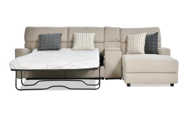 Modern Farmhouse beige 3-piece right arm facing fabric polyester sectional with power reclining sleeper chaise, cooling gel mattress, power headrest, and accent pillows.