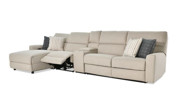 Modern Farmhouse beige 4-piece left arm facing power reclining sleeper chaise sectional in polyester fabric with power headrest, cupholders, and accent pillows.