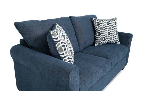 Slumber Navy 72'' Sleeper Sofa with Full Gel Mattress in blue polyester fabric, transitional style, featuring plush cushions and patterned accent pillows.