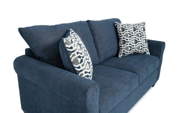 Slumber Navy 72'' Sleeper Sofa with Full Cooling Mattress, transitional style in navy polyester fabric, includes patterned accent pillows and plush memory foam upholstery.