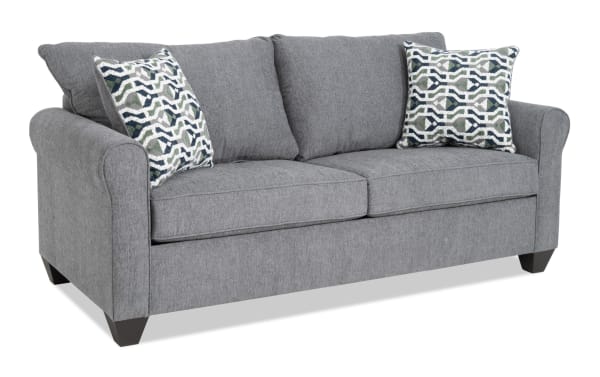 Slumber Gray 80'' transitional sleeper sofa in gray polyester fabric with plush cushions, patterned accent pillows, and a queen gel memory foam mattress.