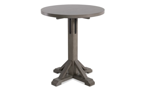 Round Iris Light Gray adjustable height dining table with transitional style, MDF and oak veneer top, poplar solid base, and fabric accents.