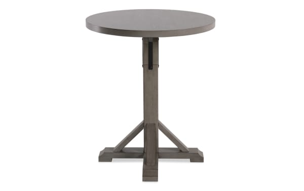 Iris Light Gray Adjustable Height Round Dining Table with transitional style, MDF and poplar solids, oak veneer top, and sturdy pedestal base.